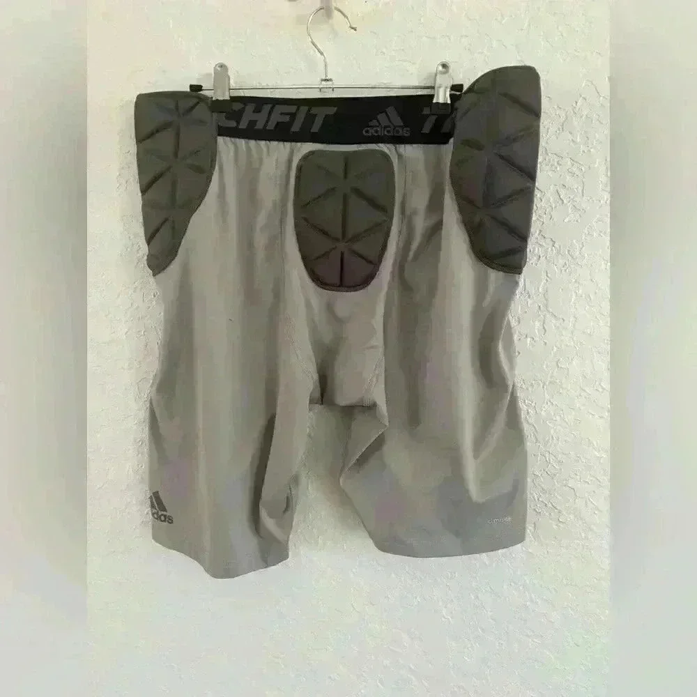 Adidas tech fit men’s XL padded compression football shorts